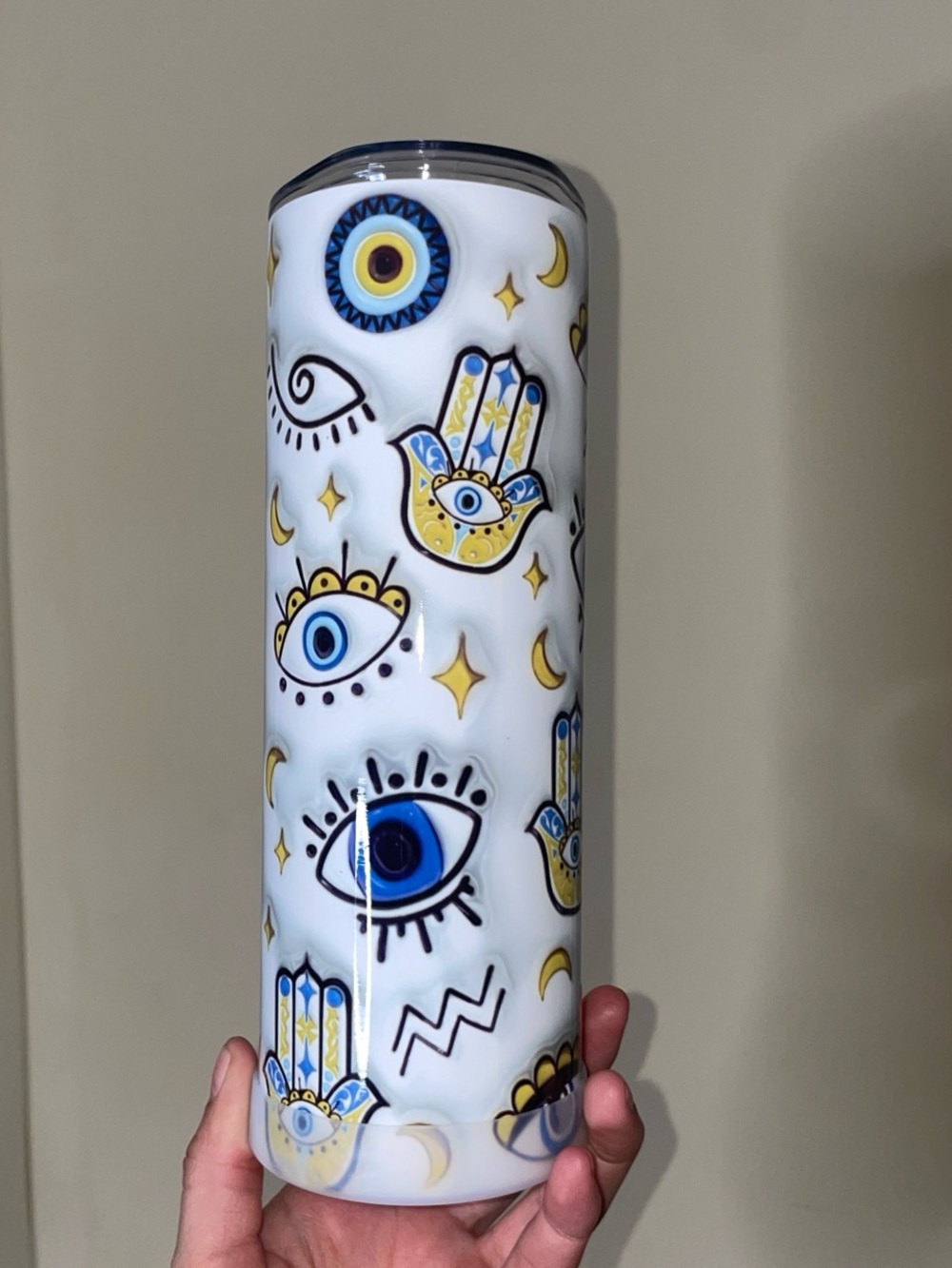 White Ceramic Tumbler with Blue & Yellow Hamsa and Eye Motif